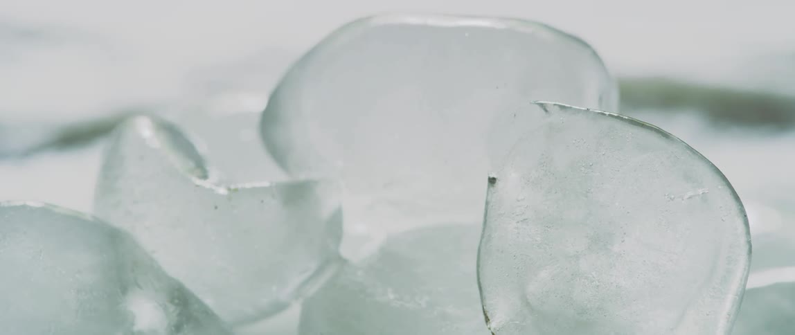 A stack of ice cubes melting