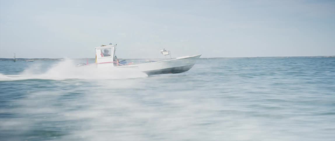 A view of a boat sailing outdoors