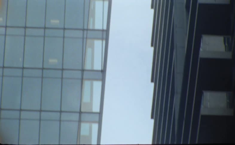 Tall skyscrapers towering overhead in a city