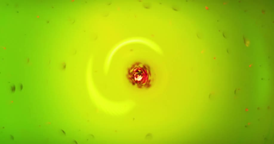 A red object is spinning in a yellow and green whirlpool as particles circle around in the current