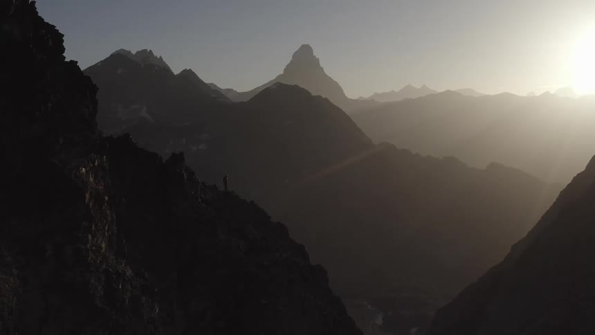 The mountains are covered with fog
