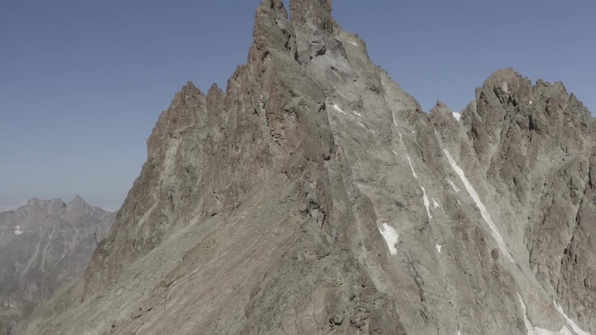 Aerial view of mountains during winter is displayed