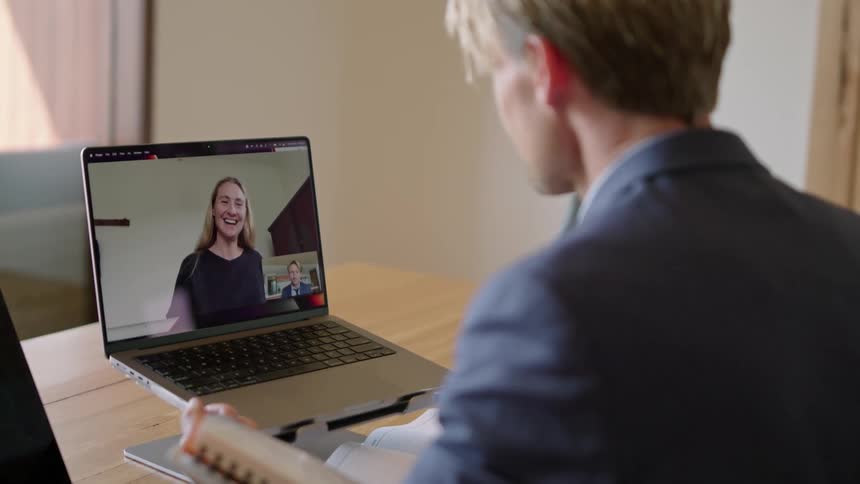 Two people talk on a video call