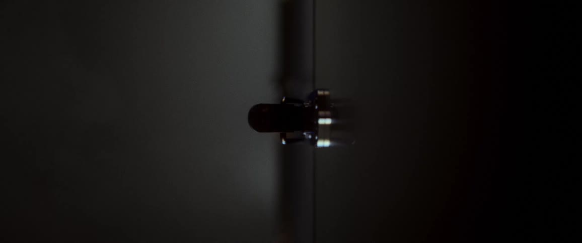 A clasp opens slowly