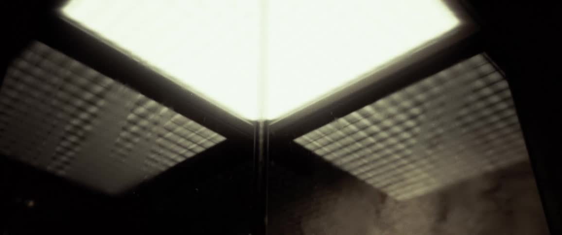 Light shines from inside a glass display case
