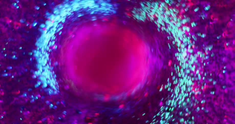 Light blue glitter particles move around a purple and pink swirling vortex as it spins