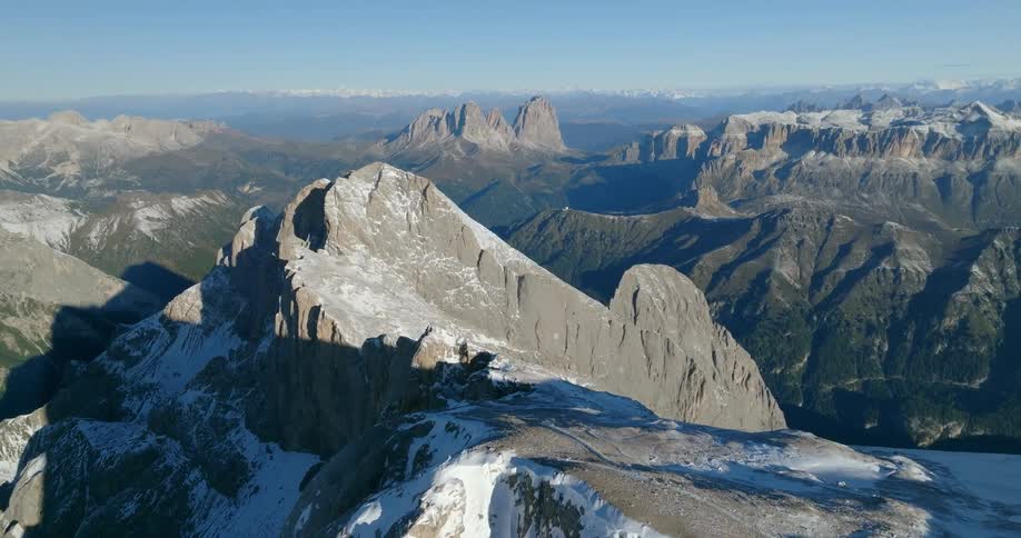 Aerial view of mountains in winter is displayed