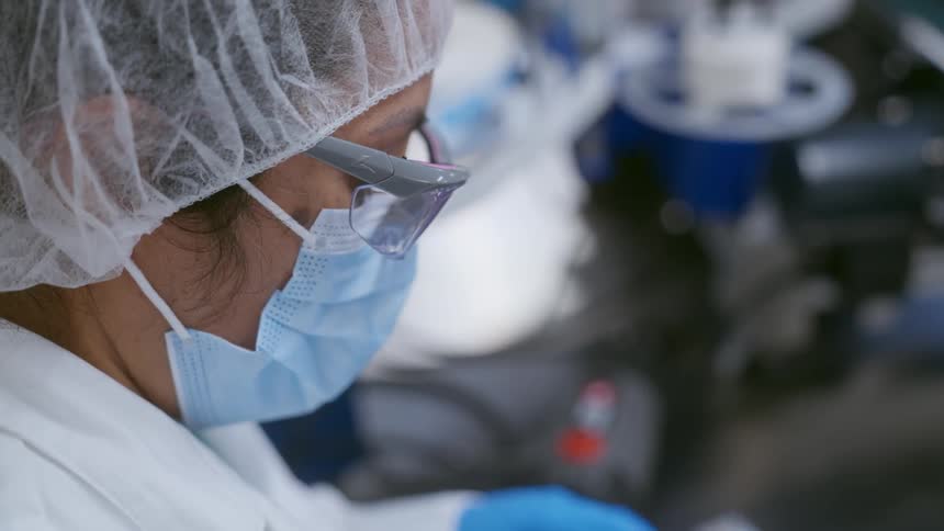 A scientist is working in the lab
