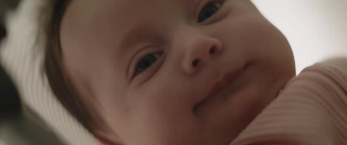 Close up of baby boys face yawning