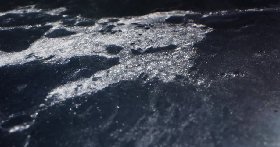The ice melts and separates