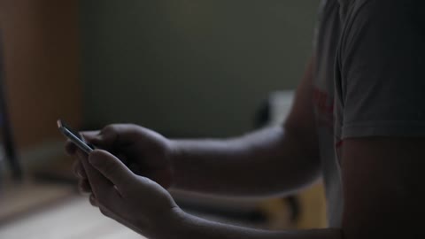 A man is using a phone