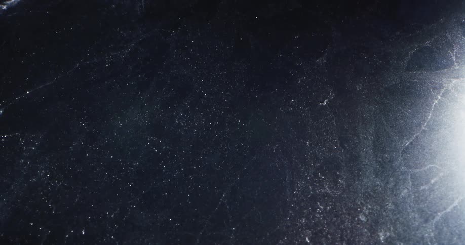 Ice and flowing water near light