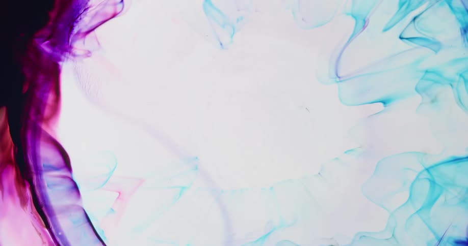Purple tinted liquid spreads in mixture blends with other colors then contracts