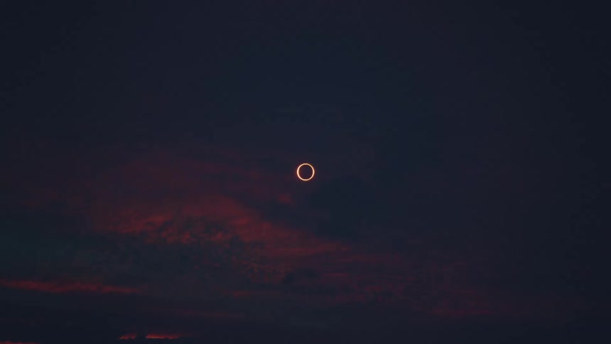 Flare and clouds in the night sky