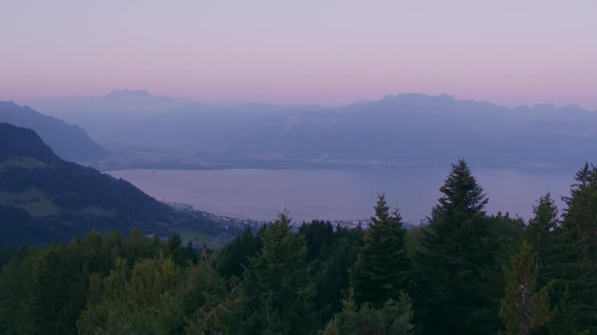 The view is of the forest area and you can see the mountains from the distance