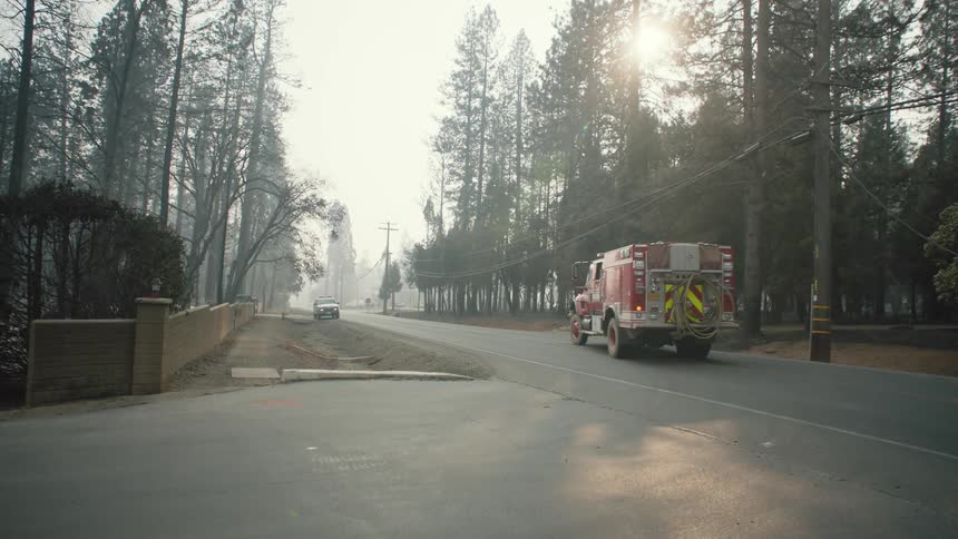 The firetruck turns the corner