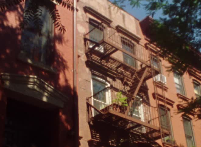 The side of a building with stairs down the side