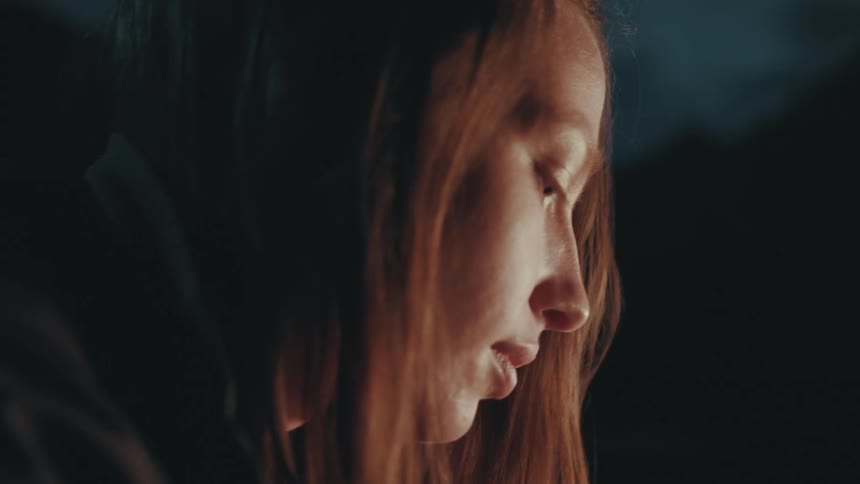 Profile of a female deep in thought