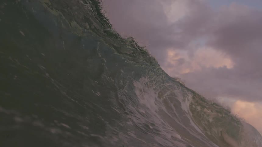A large ocean wave and then the water under the wave