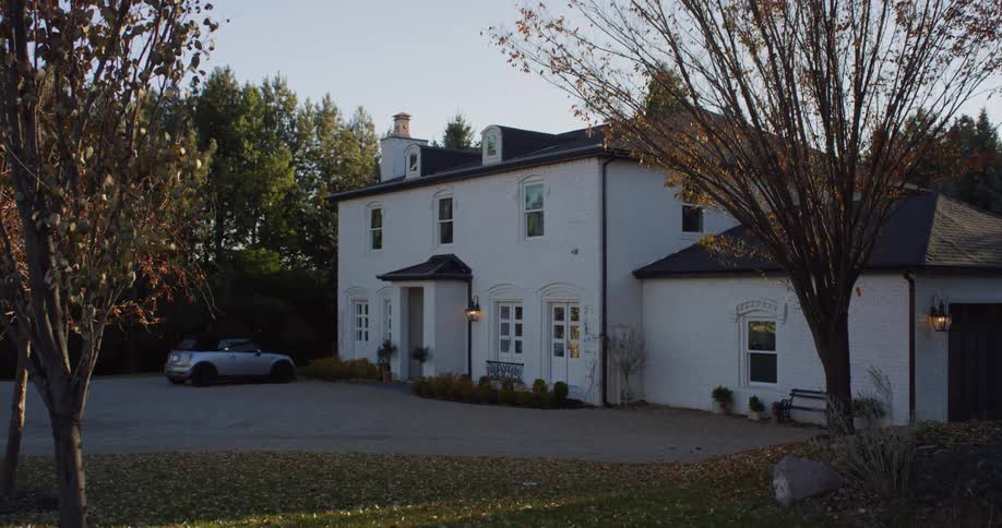 Exterior view of villa house with garden in the countryside