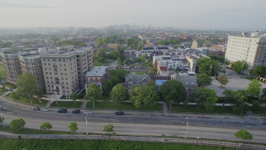 Traffic moving along an urban landscape
