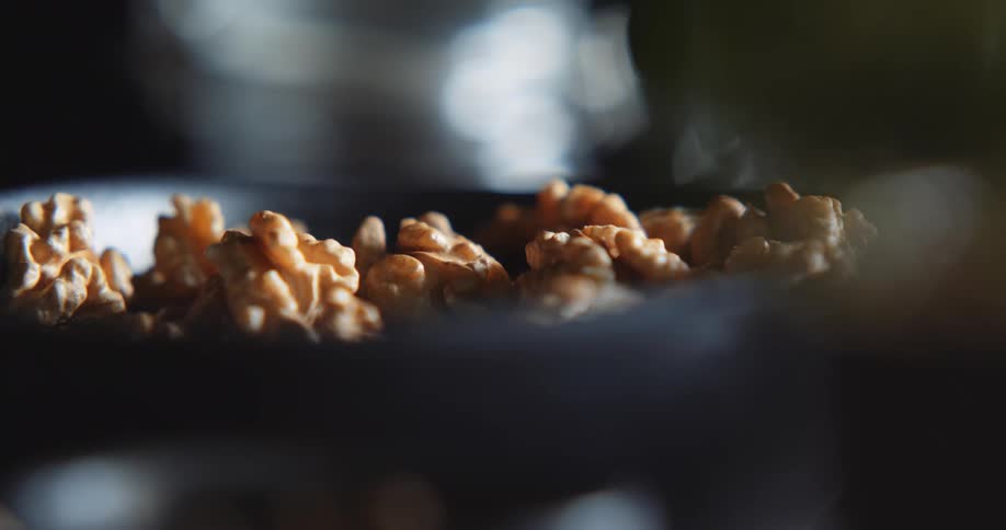 The bowl is full of walnuts