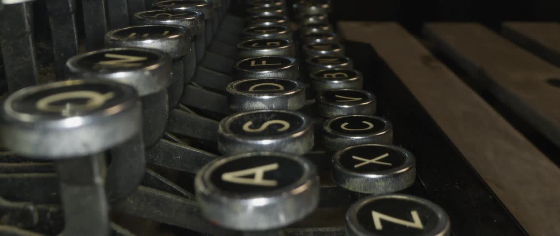 An old antique manual typewriter with round keys