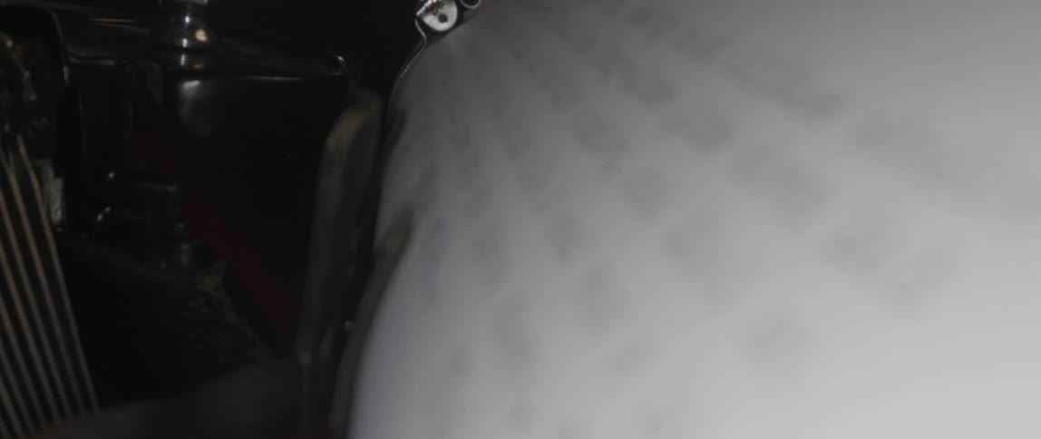 Words are printed on the paper in the typewriter