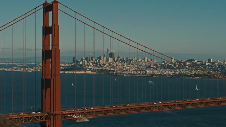 A static shot of cars driving on the Golden Gate Bridge