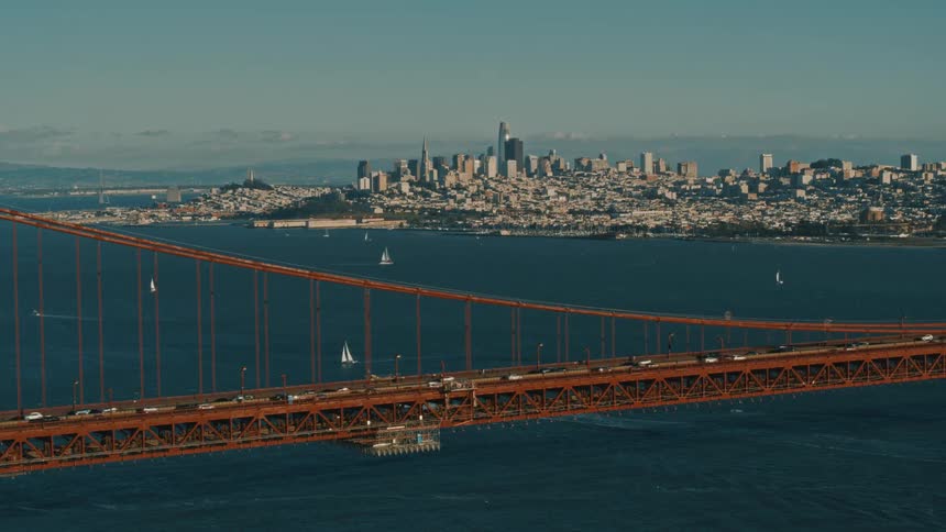 Heavy traffic passes over the golden gate bridge