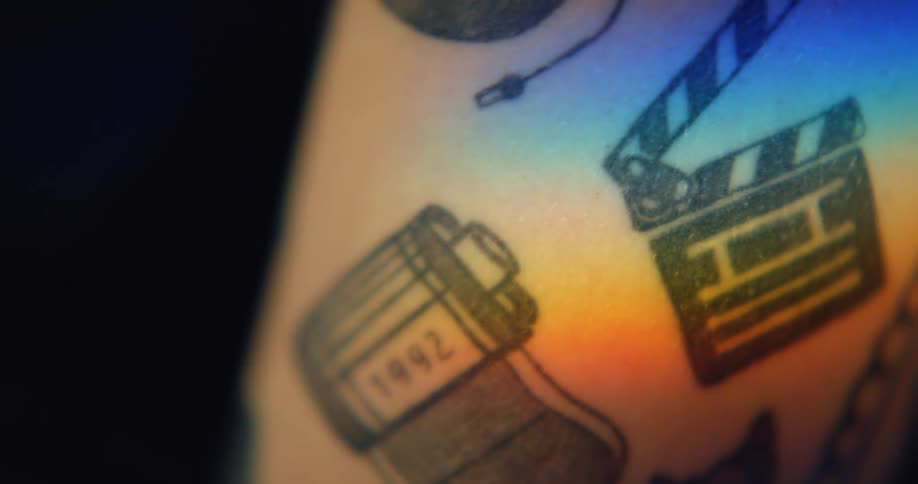 Close up of female models arm with tattoos