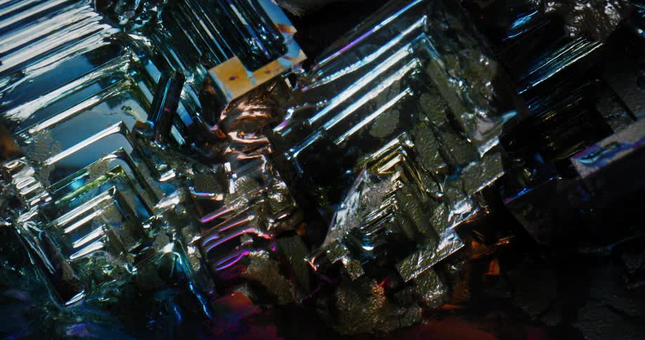 A light moves over a translucent blue gemstone