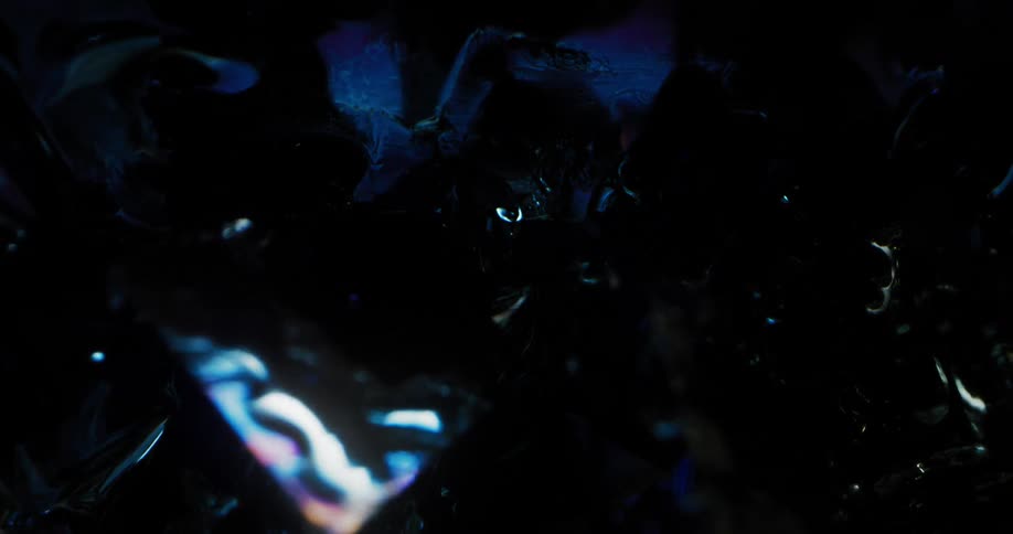 Abstract footage of light shining on gemstones