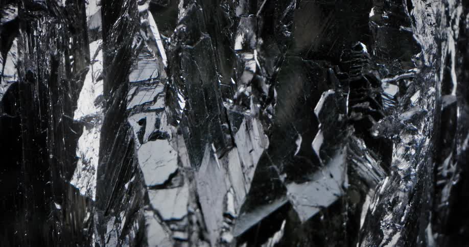 Obsidian rock is shining and glistening in the light