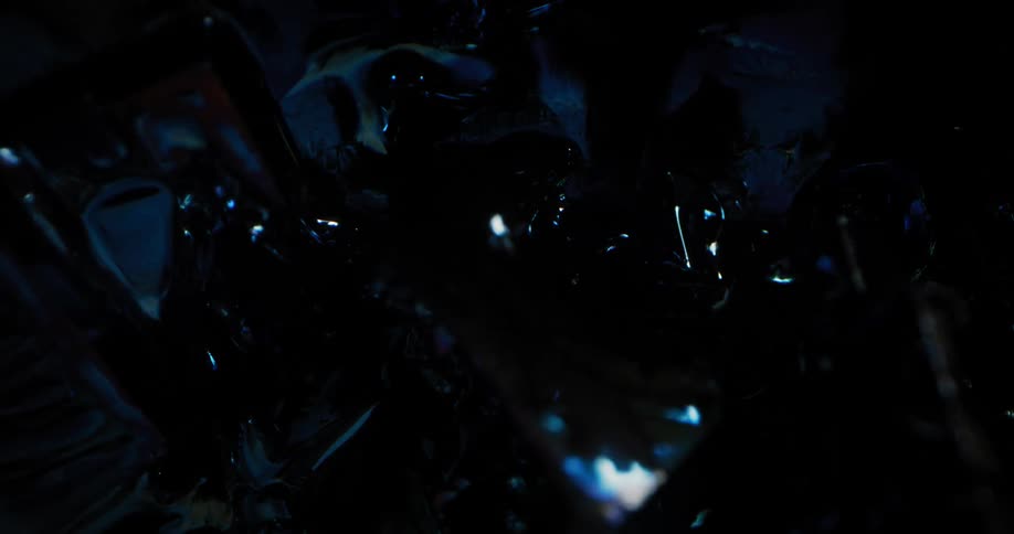 Light reflects of the surface of crystals of tungsten that form angular shapes