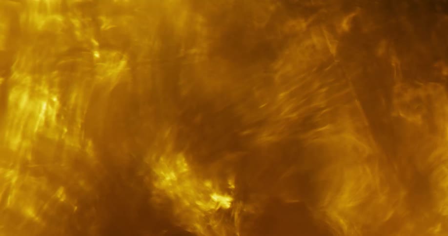 Exterior view of abstract orange liquid waving