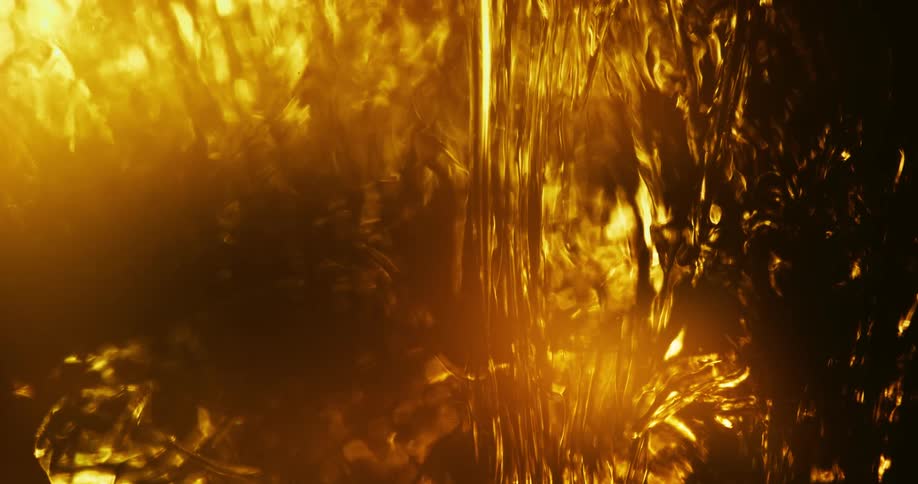 The sunlight shines on abstract liquid flowing