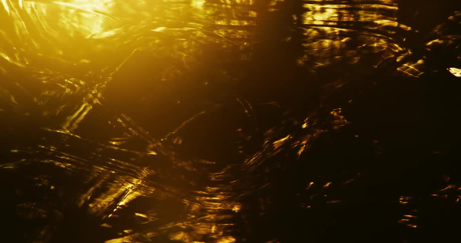 Fire reflection on water in the darkness