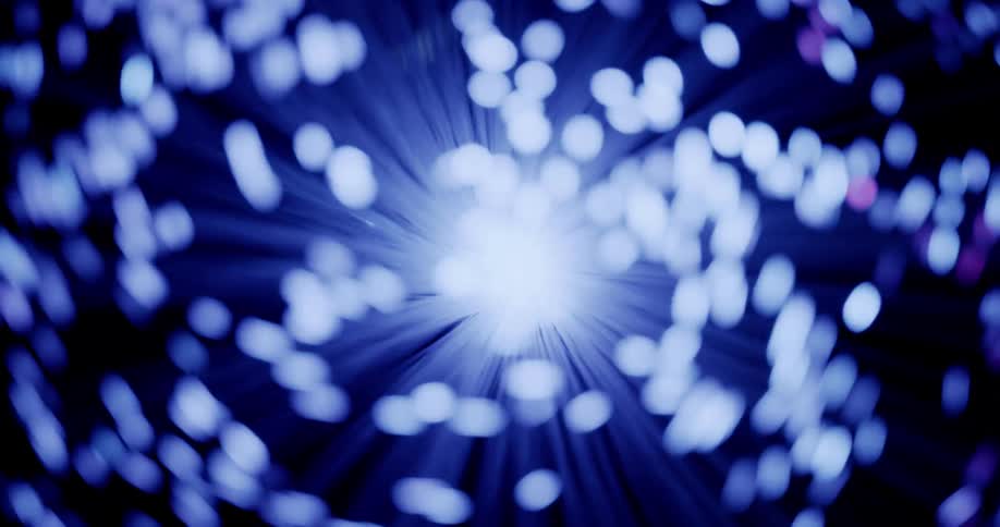 Blue filaments with glowing tips attached together at core flex and gyrate