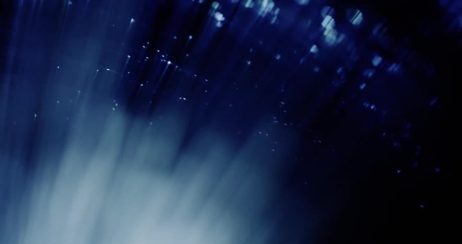 Abstract light shines underwater