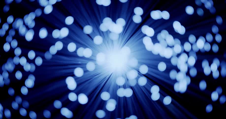 Blue and white orbs of light twirling around