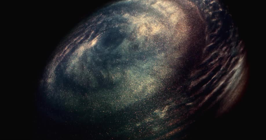A swirling disk of glittering light spins like a galaxy in space