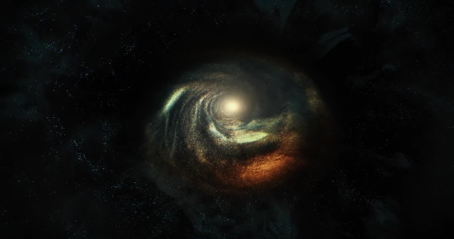 In the darkness a swirl of sparkling and shimmering particles swirl around