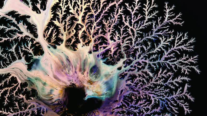 Liquid flows and swirls into spiky texture and pattern