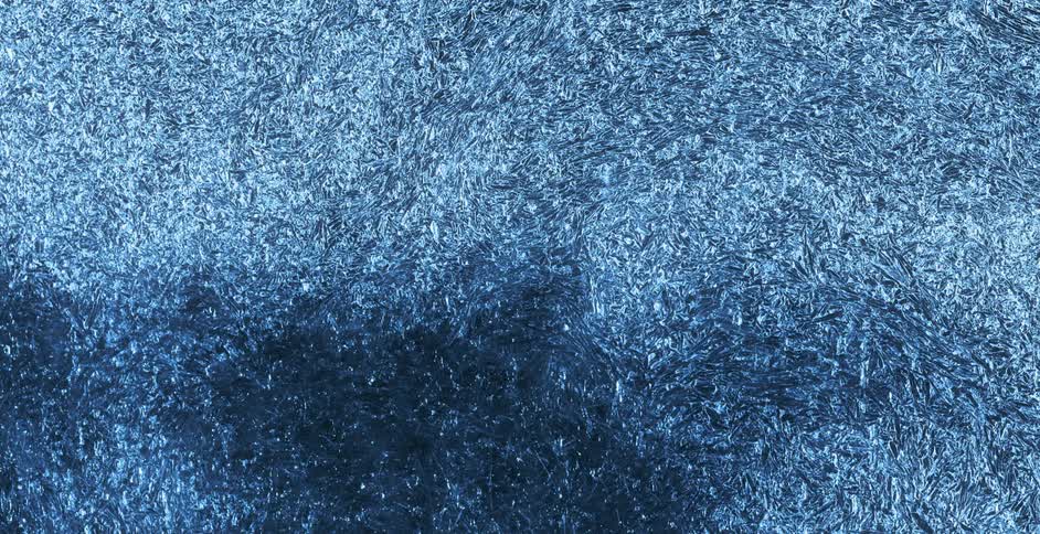 Numerous speckles of light increase in intensity as if watching a time lapse of stars getting brighter