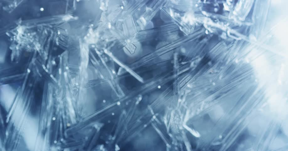 Pieces of glass with bright light overhead