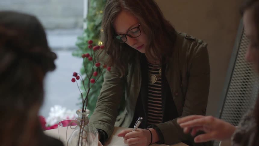 A group of people working at a table