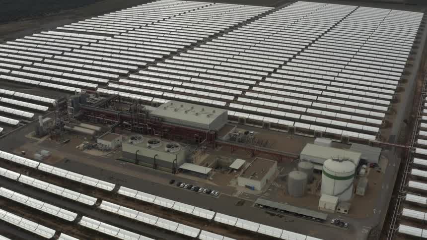 Drone shot of solar farm power plant and panels