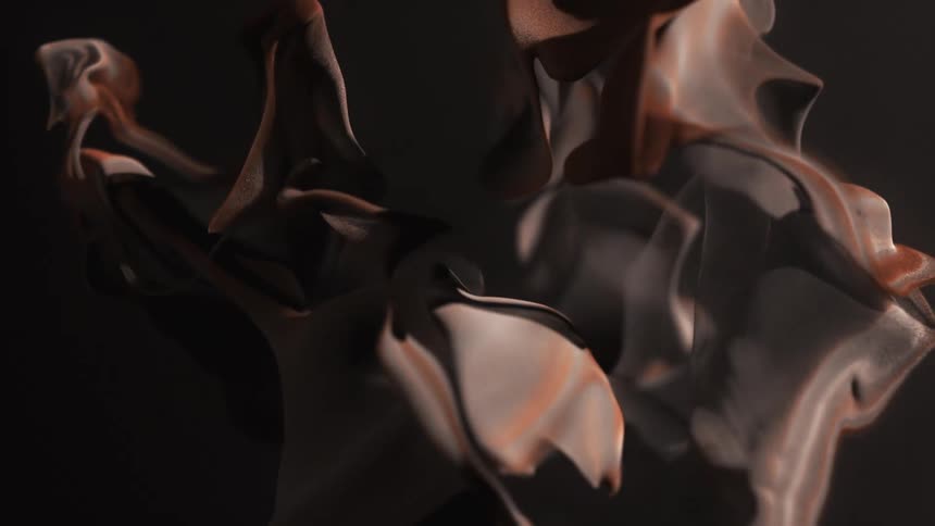 Abstract footage of a swirling brown pattern