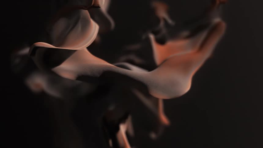 An abstract texture that resembles smoke swirls and flows around in a dark setting
